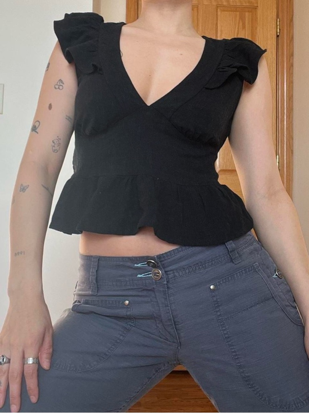 Black Ruffle Peplum V-Neck Women's Top